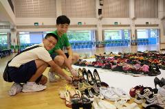 students-arranging-the-shoes (2)