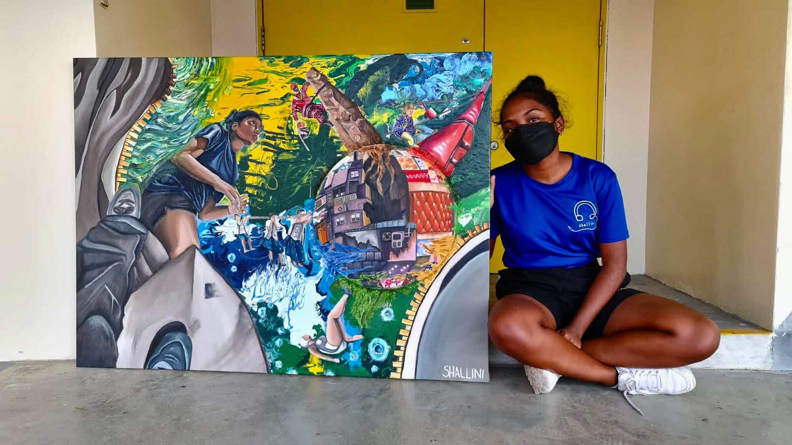 Shallini With the Art She Made During Secondary School