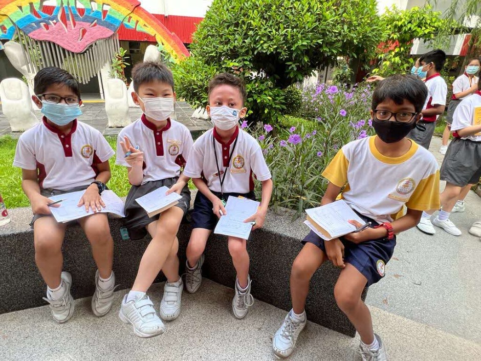 Creating haikus at the school garden.JPG